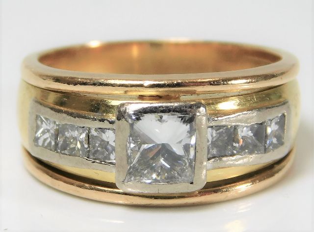 An 18ct gold diamond ring set with 0.75ct centre s