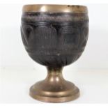 A 19thC. carved coconut shell tankard 5.5in tall