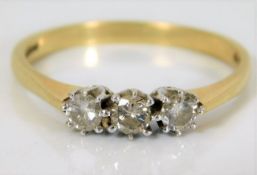 An 18ct gold trilogy ring set with approx. 0.55ct