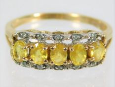 A 9ct gold ring set with lemon coloured citrine &