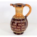 A Royal Doulton stoneware puzzle jug with motto