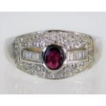 An 18ct white gold & diamond ring set with ruby 4.