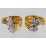 A pair of 14ct gold diamond earrings 6.4g