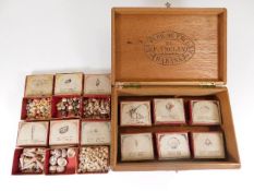 An early 20thC. boxed quantity of vintage collecto