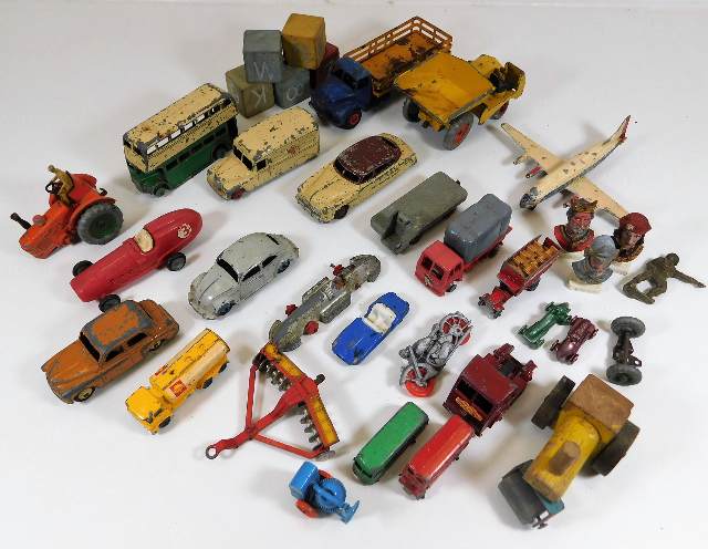 A quantity of child's play worn toys including die