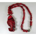 A "red coral" fish necklace