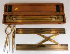 A cased rolling rule & other draughtsman's tools.