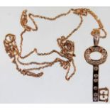 An 18ct pink gold chain & key pendant set with dia