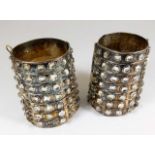 A pair of early 20thC. ladies jewelled Asian silve