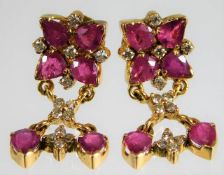 A pair of 18ct gold ruby & diamond earrings 8.2g