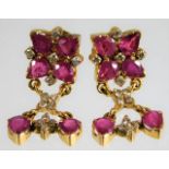 A pair of 18ct gold ruby & diamond earrings 8.2g