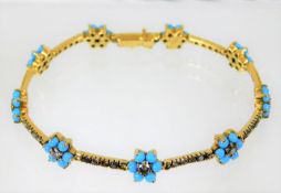 An 18ct gold diamond & turquoise bracelet 14.8g 7.