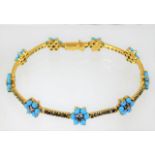 An 18ct gold diamond & turquoise bracelet 14.8g 7.