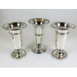 Three silver posy vases, some faults 598g