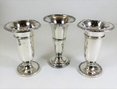 Three silver posy vases, some faults 598g