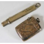 A silver mounted pencil with vesta case