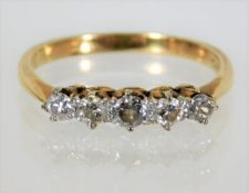 An 18ct gold five stone diamond ring approx. 0.45c