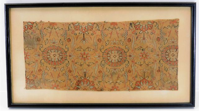 A framed 18thC. Persian silk cutting, approx. 13.2