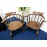 A pair of 19thC. elm smokers chairs