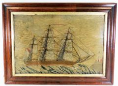 A 19thC. woolwork picture of sail ship with lighth