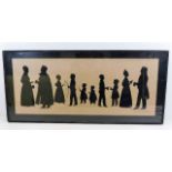 A framed 19thC. family silhouette group, size 30.2
