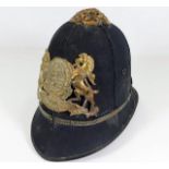 A Victorian police style helmet with motto Dieu Et