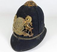 A Victorian police style helmet with motto Dieu Et