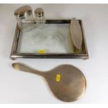 A silver mounted dressing table tray with mirror,