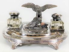 A 19thC. silver plated ink stand with eagle finial