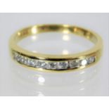 A 9ct half eternity ring set with 0.25ct diamond s