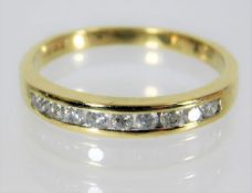 A 9ct half eternity ring set with 0.25ct diamond s