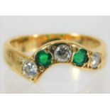 An 18ct gold ring set with emerald & diamond 4g si