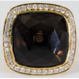 An 18ct gold smokey quartz & 0.6ct diamond ring 16