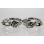 A pair of 14ct white gold earrings with approx. 0.