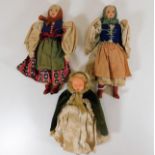 Three continental childs dolls