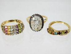 Three 9ct gold rings set with mixed stones 11g