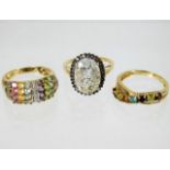 Three 9ct gold rings set with mixed stones 11g