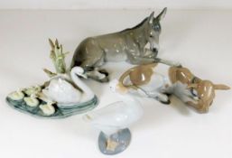 A Lladro donkey 4.75in tall & three of Lladro anim