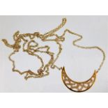 An 18ct gold necklace & pendant set with diamonds