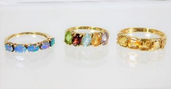 Three 9ct gold rings with mixed stones 6.1g