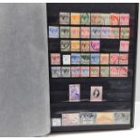 A large British Commonwealth stamp album