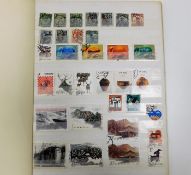 An album of world stamps including China, France &