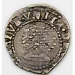 A small English silver coin with rose to verso 13.