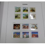 A large Alderney stamp album, mint & used