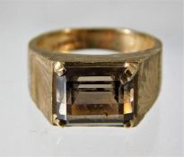 A 9ct gold signet ring set with quartz style stone