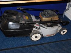 A Briggs & Stratton petrol mower