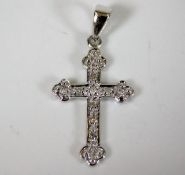 A 9ct white gold cross set with diamonds approx. 1