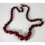 A set of cherry amber bakelite beads 40.5g