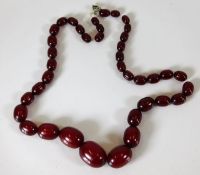 A set of cherry amber bakelite beads 40.5g