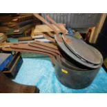 Four copper saucepans with lids